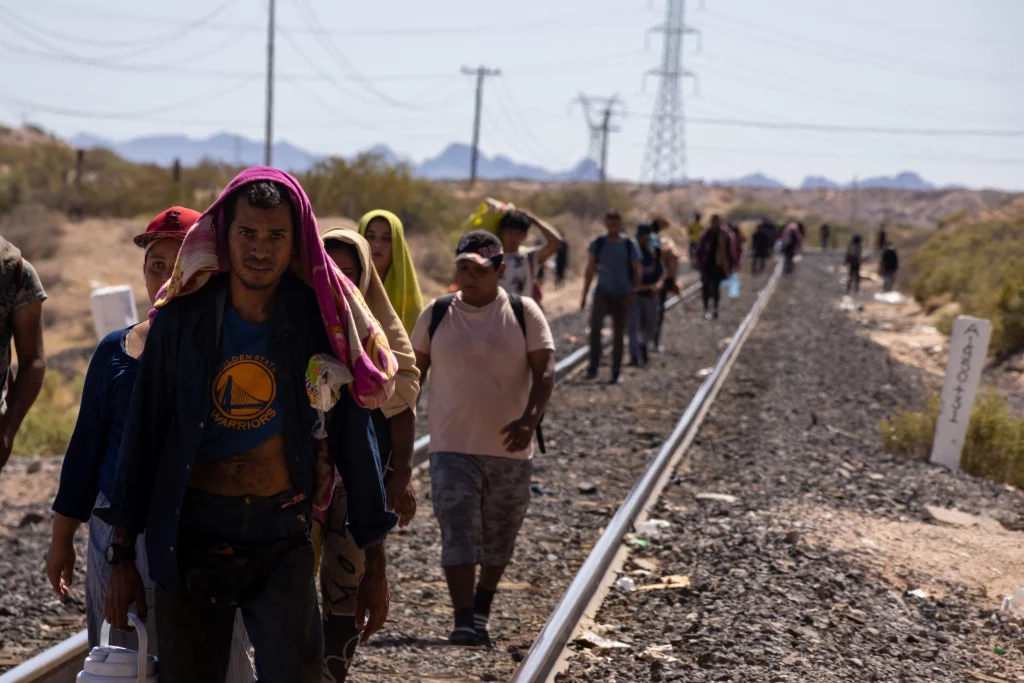 Migrants Walk Alongside the Railroad Tracks After Dismounting from the 'La Bestia' Train, Which They Rode Through Mexico to Reach the Mexico-U.S. Border - Chihuahua, Mexico