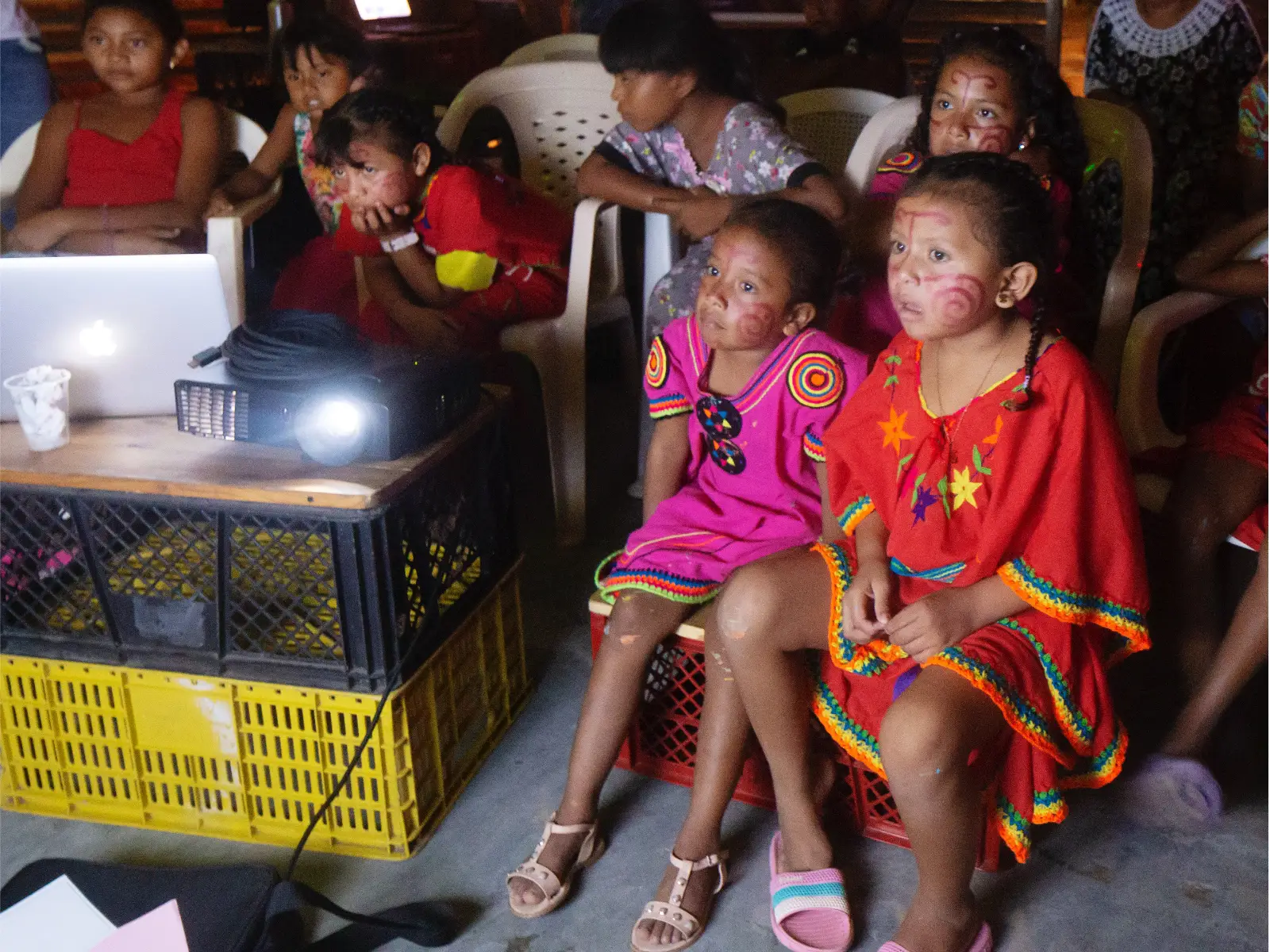 South American girls in colourful clothes in a classroom